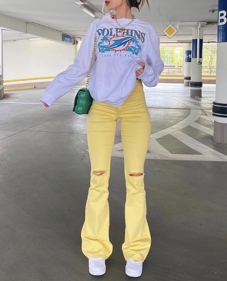 yellow flare jeans outfit